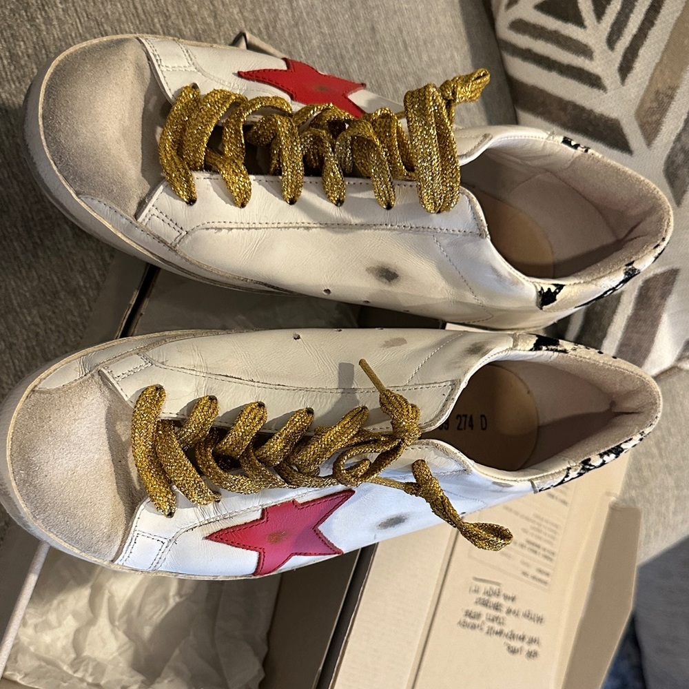 Golden Goose White Sneakers with Gold Laces and Red Star